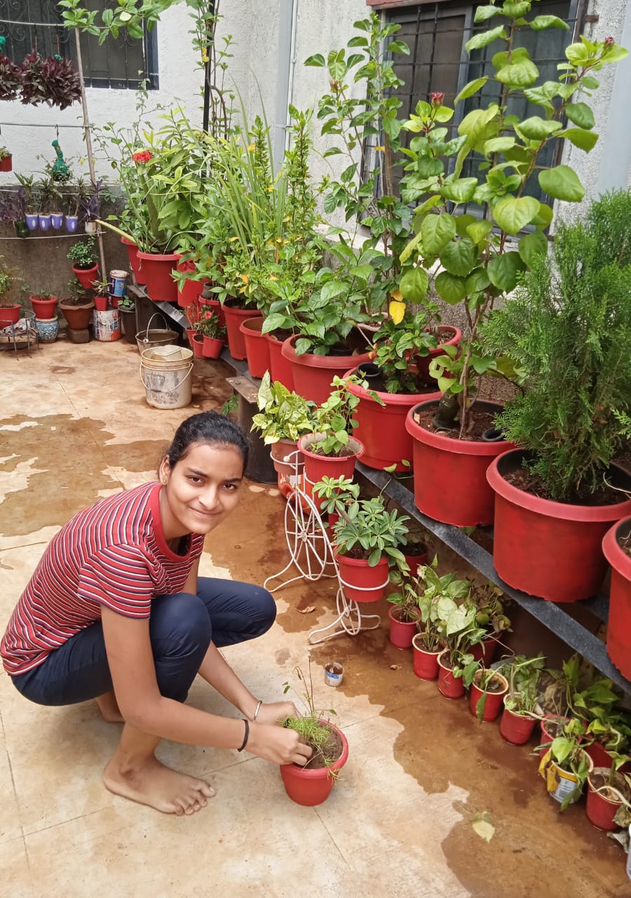 NSS Volunteer Vaishnavi Planting a sapling on World Environment Day_2021-06-05